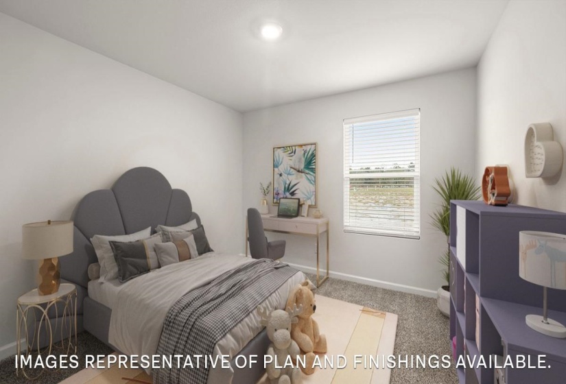 Bedroom featuring light colored carpet and baseboards