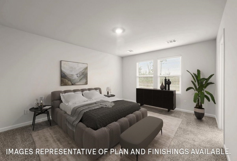 Bedroom with light colored carpet