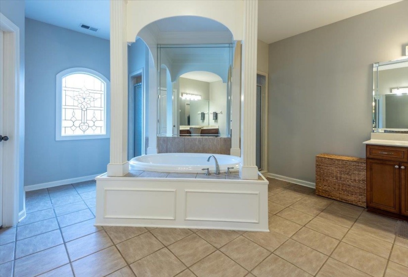 Soaking tub with tile surround and column accents