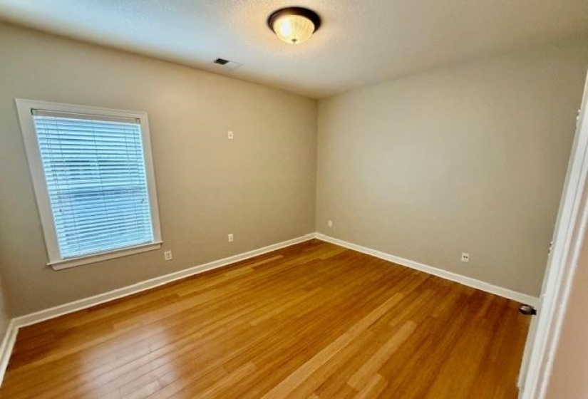 Hardwood-style flooring throughout