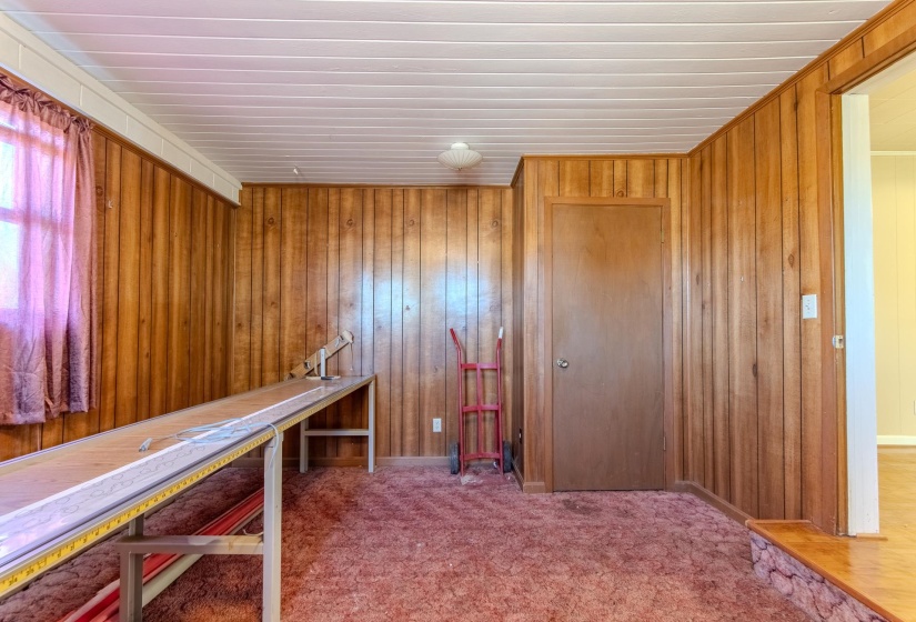 Carpet floors and wooden walls