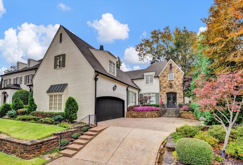 With timeless painted brick, elegant stone accents, and manicured landscaping, this gem in Germantown's prestigious Nottoway subdivision is beautifully positioned on an elevated lot with scenic views and thoughtfully designed terraced landscaping.