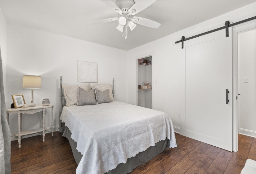 White walls complemented by wood-finish flooring