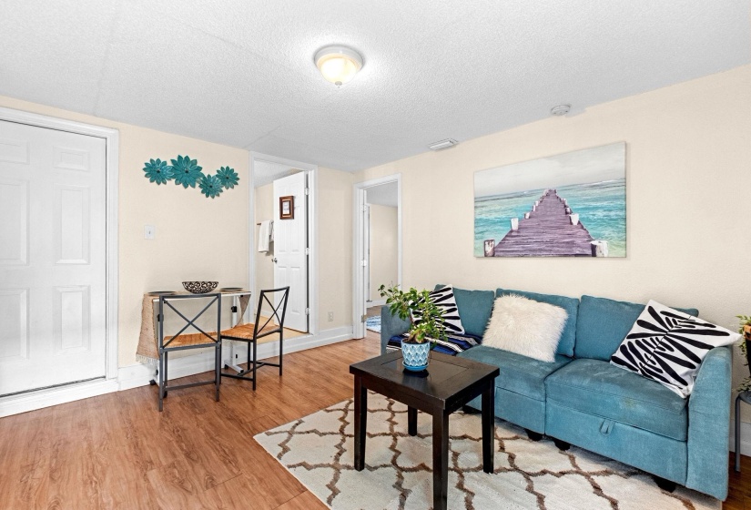 Interior room featuring wood-finish flooring