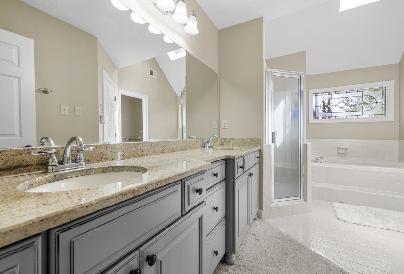 Double vanity with granite countertops and undermount sinks