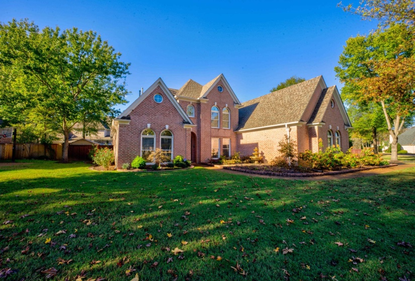 View of front property with a front yard