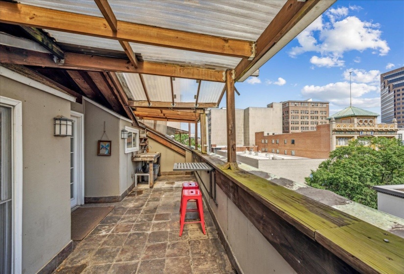 View of patio / terrace featuring a balcony and a view of city
