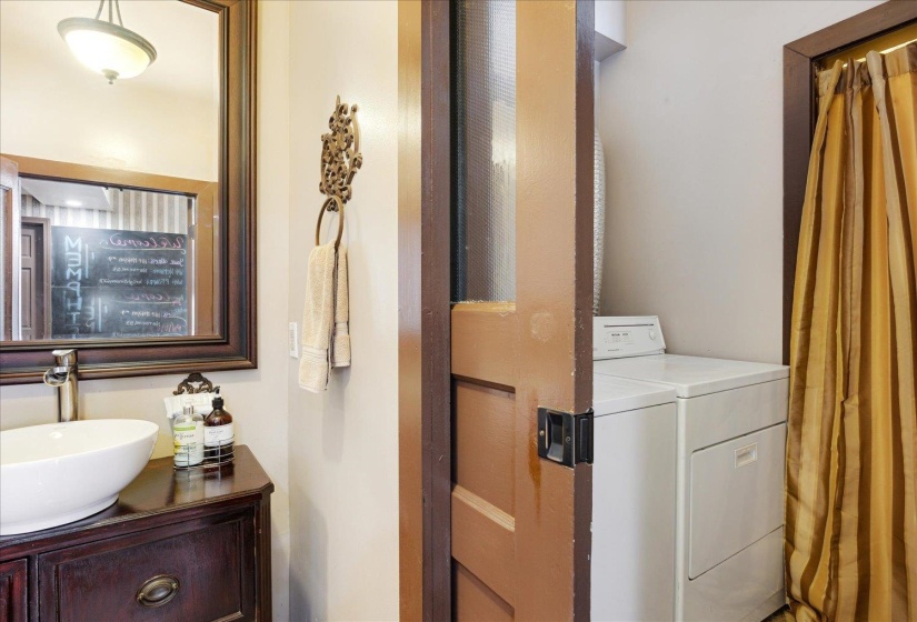Laundry area with washing machine and clothes dryer