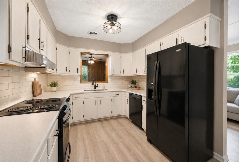 How would you design this kitchen?  Paint the cabinets, update counters, the possibilities are endless!
