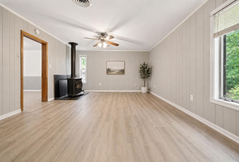What a difference little bit of paint and flooring can do to update this room.  This house can be your canvas to express your inner designer!