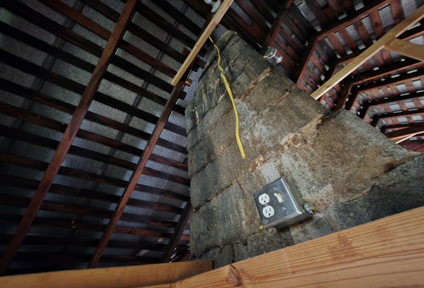 Exposed rafters and roof sheathing showcasing structural elements
