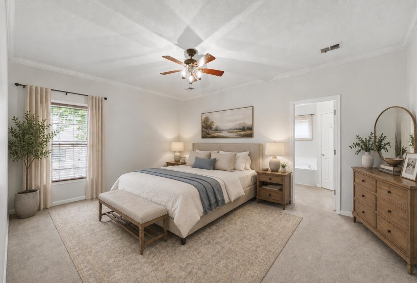 Spacious primary bedroom. Furniture is virtually staged.