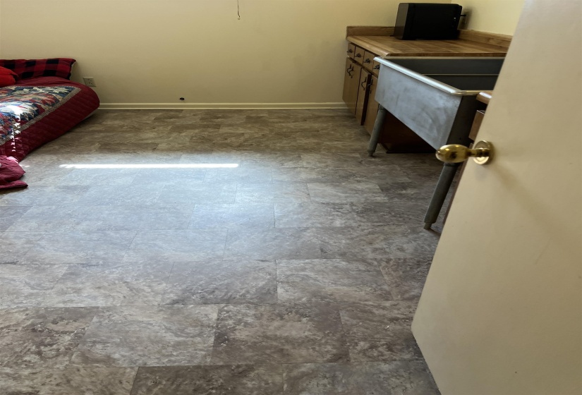 Interior space with stone finish floor and baseboards