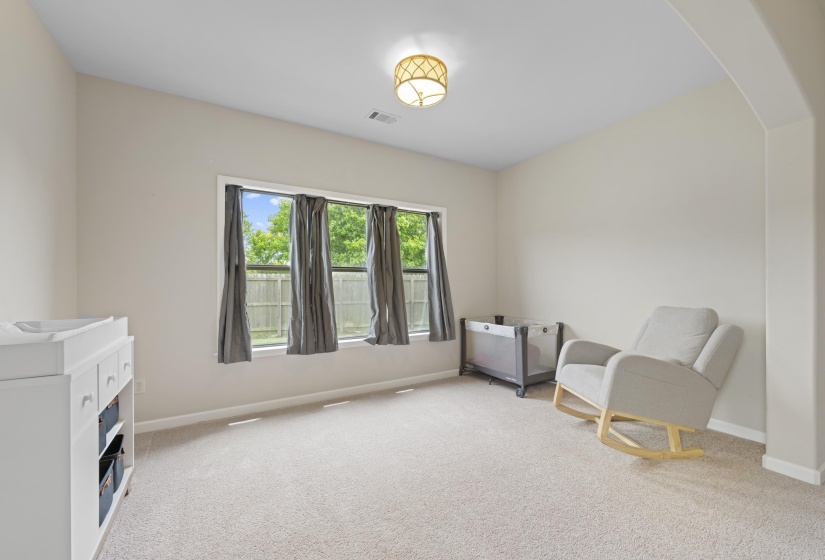 Sitting area located off of Primary with neutral wall great for nursery or reading and relaxing!