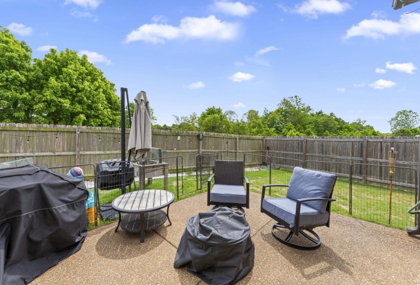 Expansive concrete patio area offering significant outdoor space