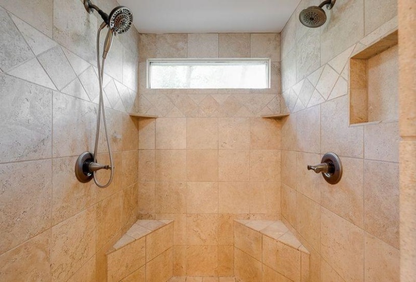 Bathroom with a tile shower