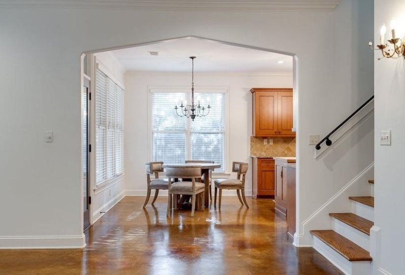 Dining area featuring ornamental molding