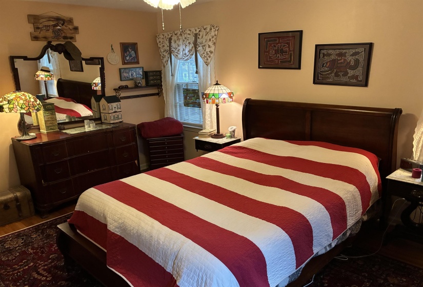 Dark wood-finish headboard and bed frame