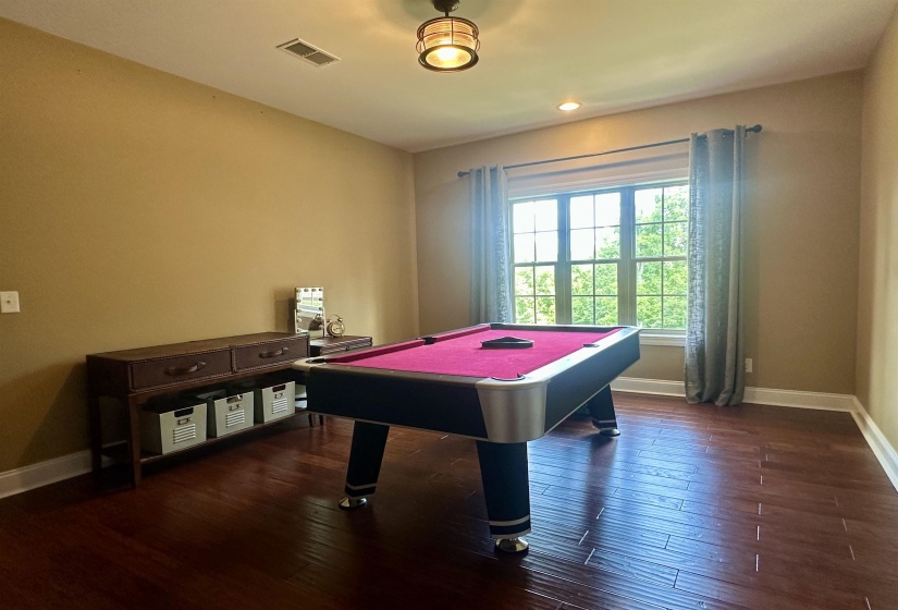 Playroom featuring dark wood finished floors, billiards table, and recessed lighting