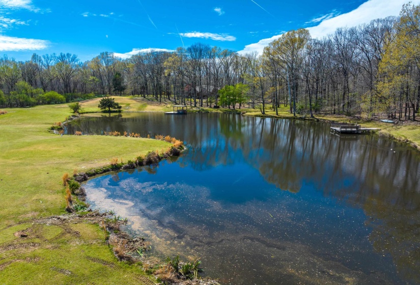 Property view of water with a forest view
