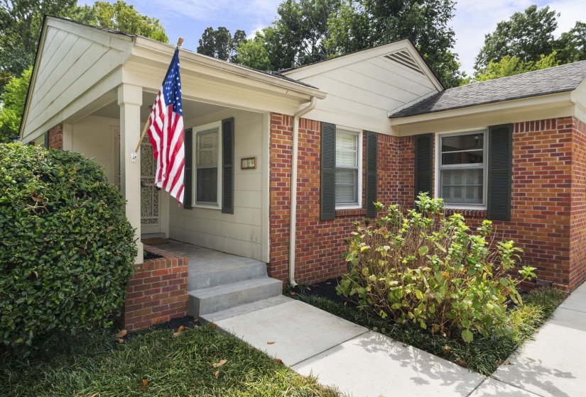 Brick exterior, Covered Front Porch with Brick Planter Box