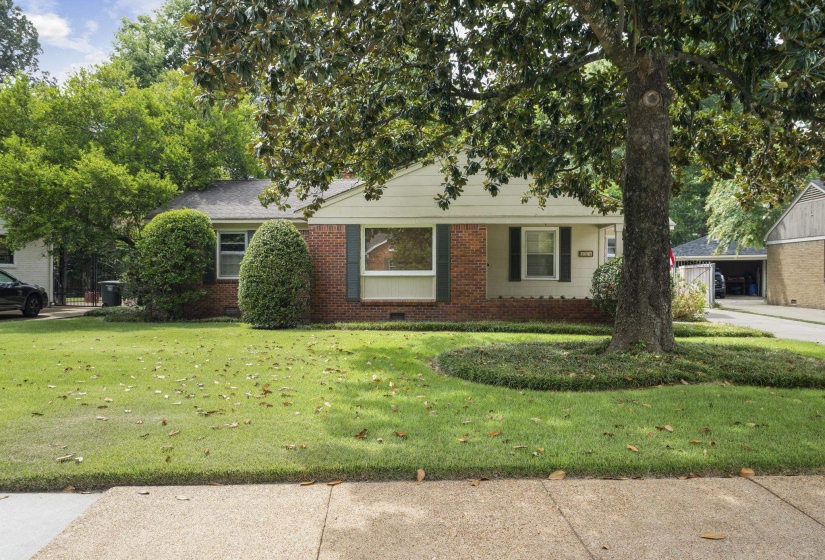 Brick exterior with a prominent front-facing picture window