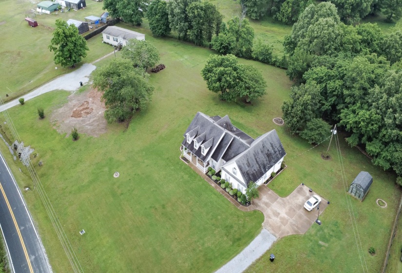 Single-family residence featuring a prominent gabled roofline with multiple dormers