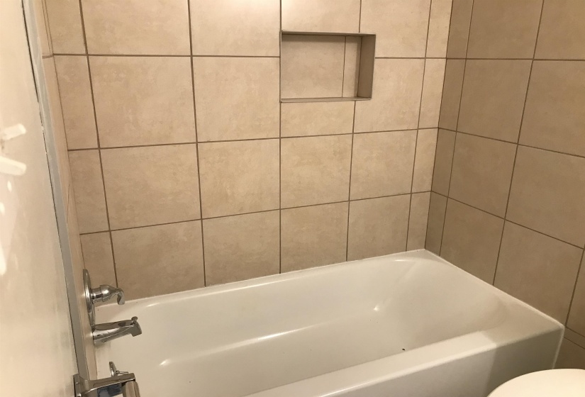 Full bath with shower / tub combination