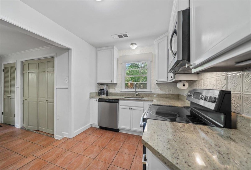 Another view of the kitchen looking towards the breakfast room.