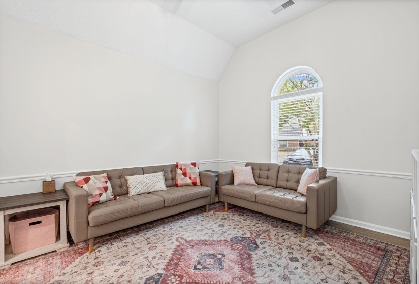 Formal dining room currently used as an extra living room.