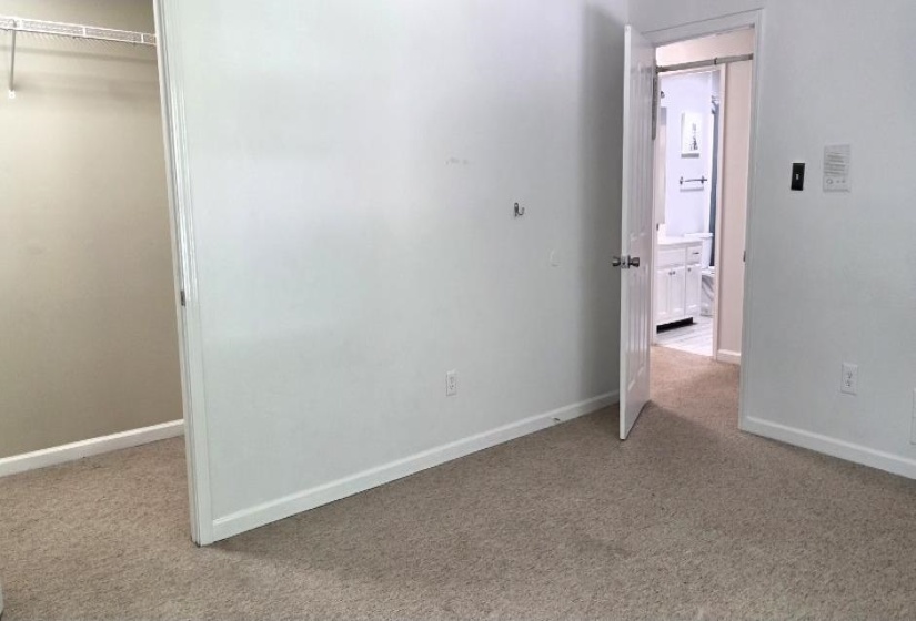 Upstairs Bedroom with walk in closet.