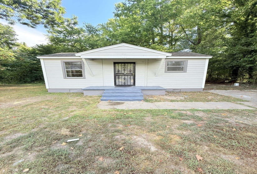 Bungalow-style home with crawl space and a front lawn