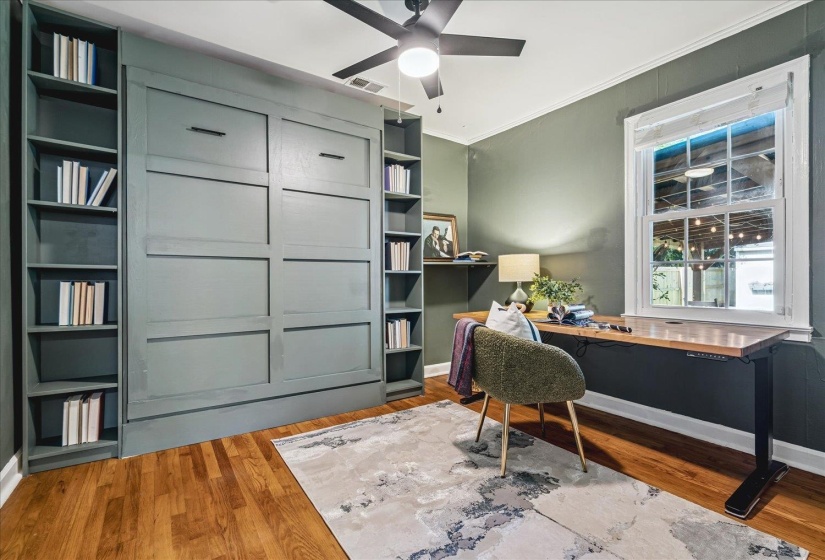 Built in Murphy Bed. Perfect if you work from home, need some extra space for guests, but don't need a a bed all of the time.