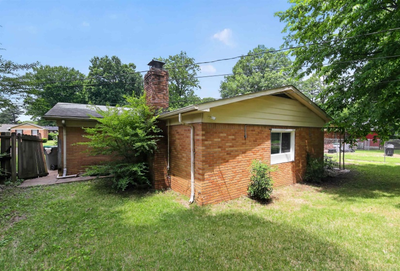 Brick exterior with a prominent brick chimney