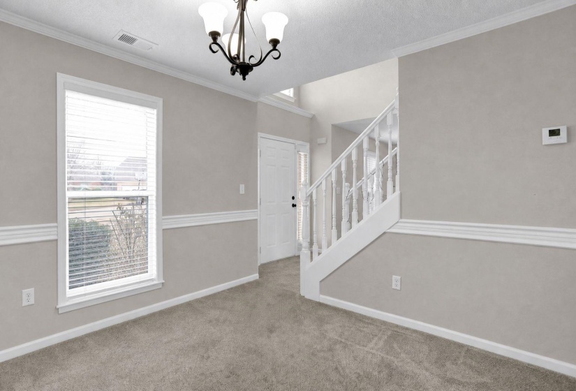 Formal Dining room makes a great flexible space for an office, playroom or small den.