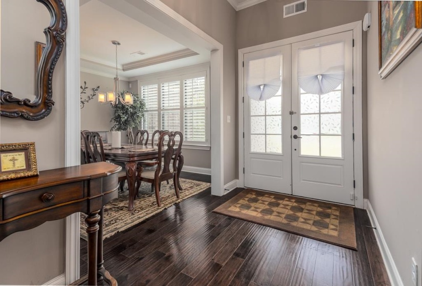 Double entry doors with patterned glass panels