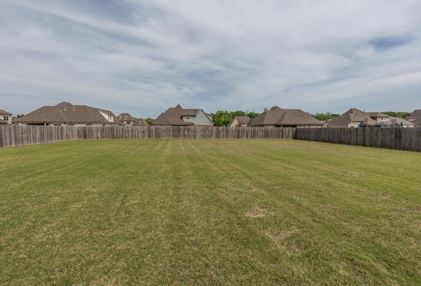 Expansive green lawn providing abundant outdoor space