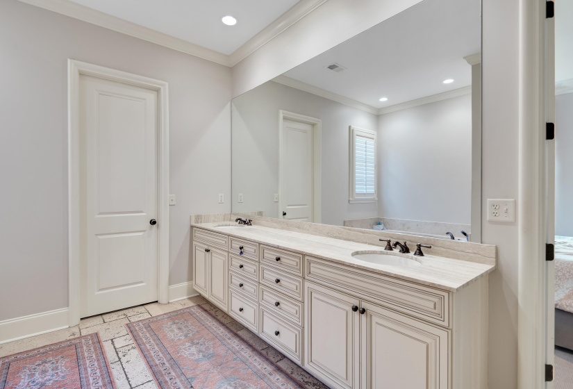 Double vanity with stone countertop and integrated sinks