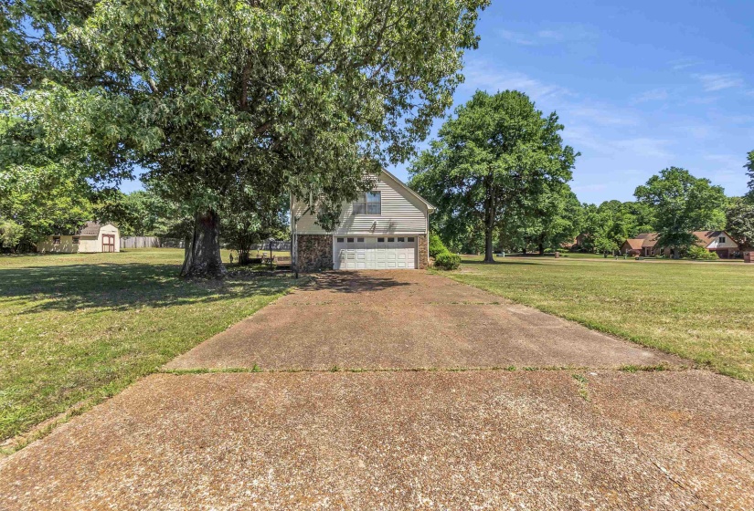 Concrete driveway with ample parking