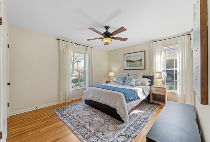 Bedroom featuring a ceiling fan and light wood-style floors