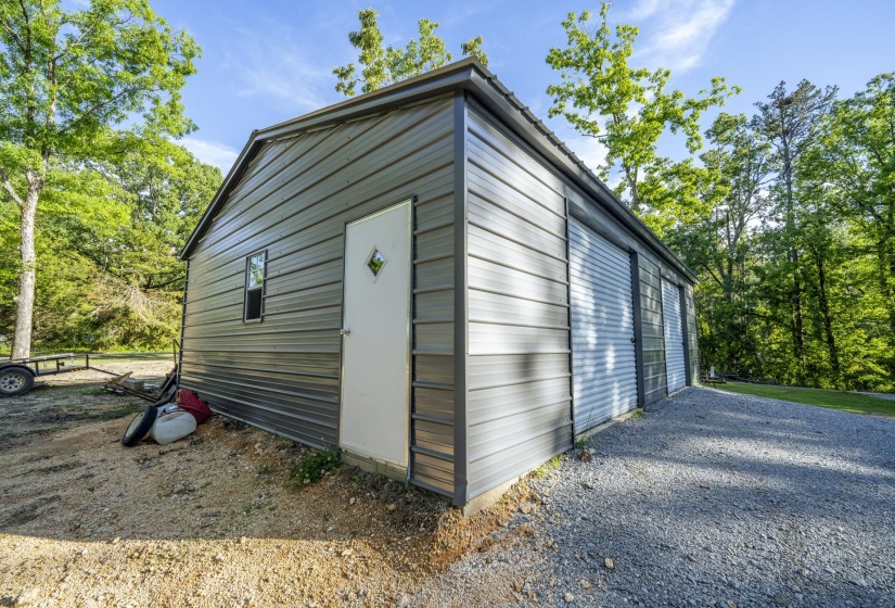 Metal utility building with a pitched roof