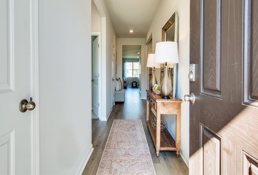 Hallway featuring hardwood / wood-style flooring