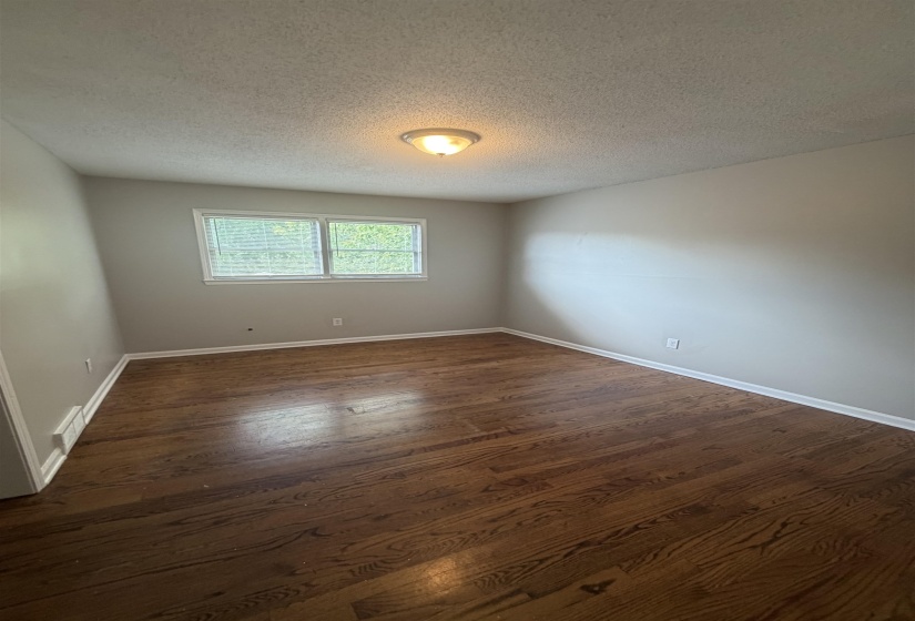 Hardwood-finish flooring featuring a rich brown tone