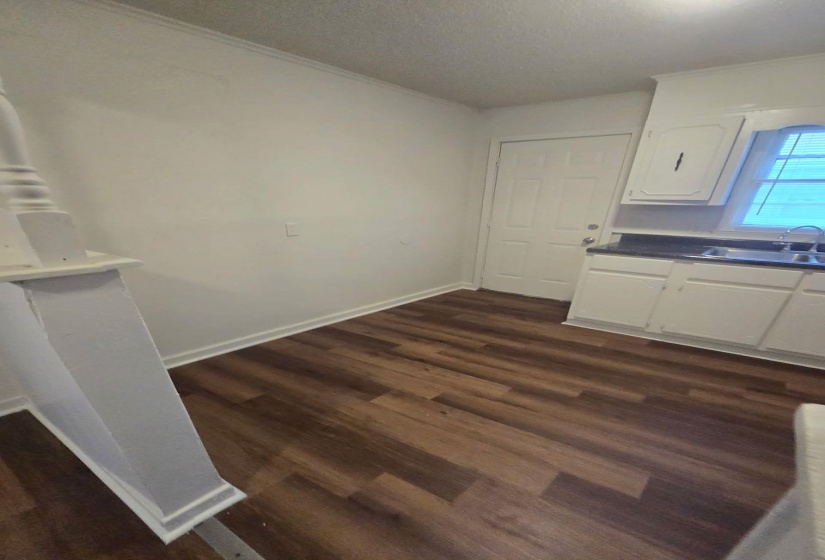 Wood-finish flooring throughout