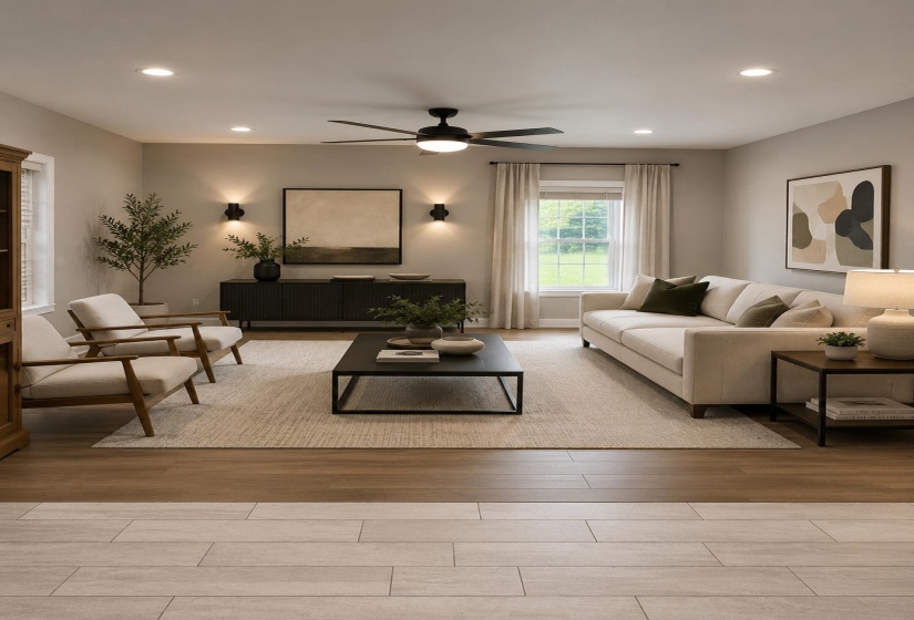 Living area featuring recessed lighting, a ceiling fan, and sconce lighting