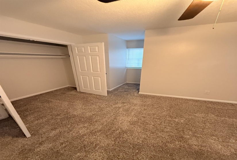 Neutral-toned carpeting throughout