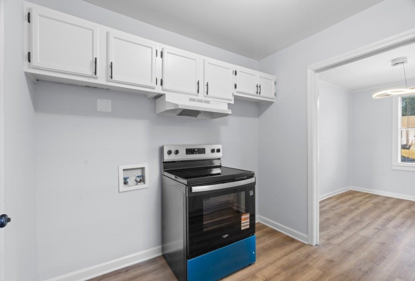 Bright white cabinetry with sleek black hardware
