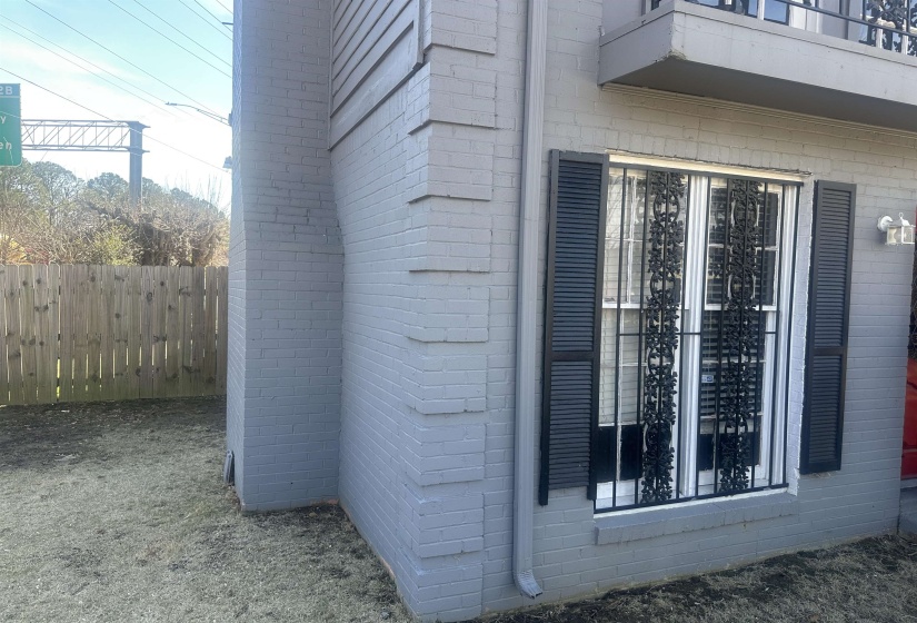Brick exterior with painted siding accents