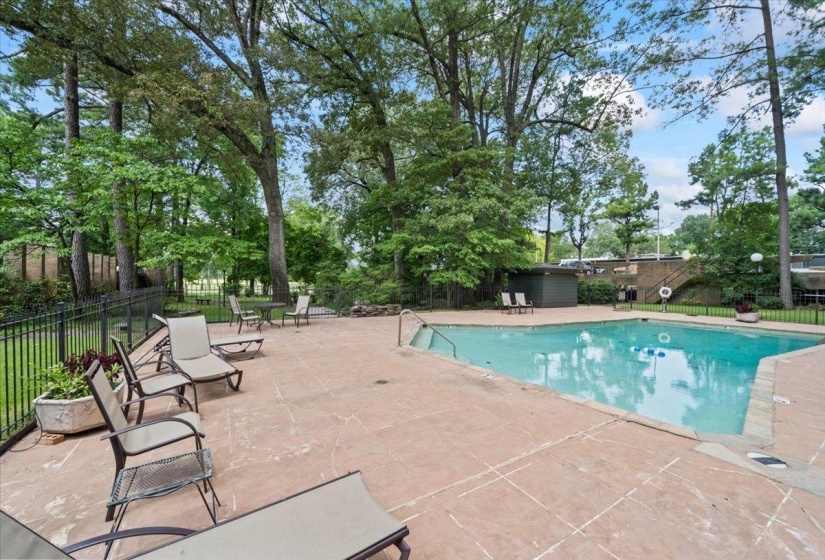 Community pool featuring a patio area