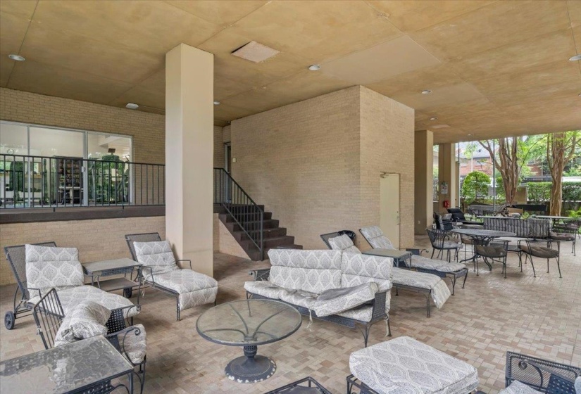View of patio / terrace with an outdoor living space and stairs
